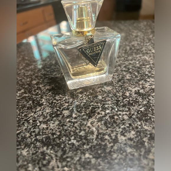 Guess Seductive perfume. Has some left in bottle. Fun and flirty. - Picture 3 of 6